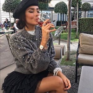 Cropped sweater with faux pearls